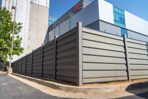pvc privacy fence around a building