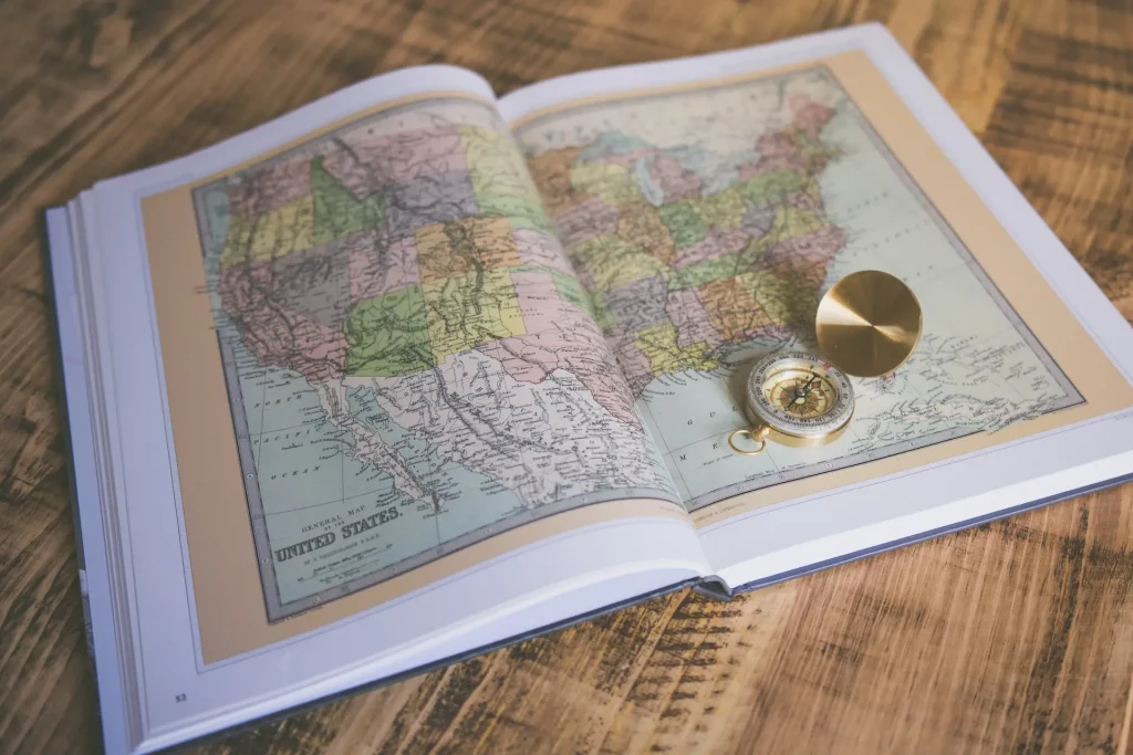 Open map book with compass