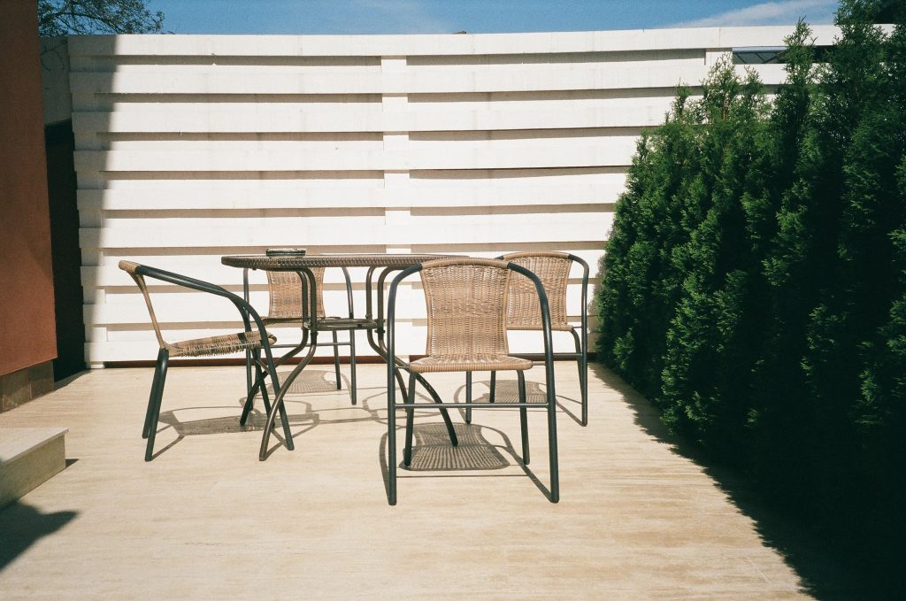Horizontal Fence by patio furniture