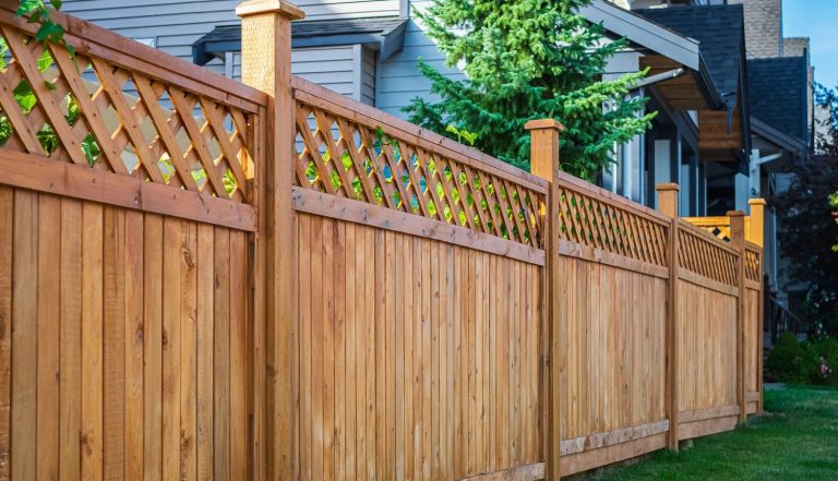 wooden privacy fence with lattice top for backyard
